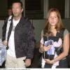 Eric Clapton et sa femme Melia avec leur fille Julie Rose à l'aéroport de Londres en 2002.