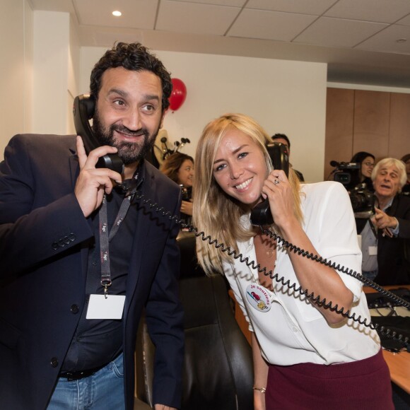 Cyril Hanouna et Enora Malagré - 11e édition du "BGC Charity Day" à Paris le 11 septembre 2015 en mémoire aux 658 collaborateurs du groupe BGC partners (leader mondial du courtage interbancaire) disparus il y a 14 ans dans les attentats du World Trade Center le 11 septembre 2001.