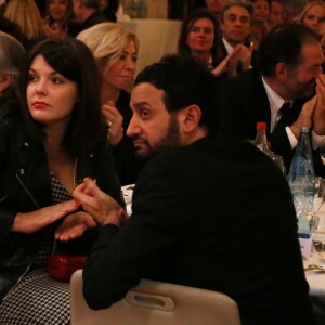 Exclusif - L'animateur Cyril Hanouna et sa compagne Emilie à l'Hôtel de Ville de Paris le 10 décembre 2013.