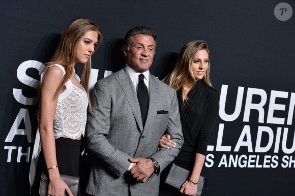 Sylvester Stallone et ses filles Sophia et Sistene assistent au défilé "Saint Laurent at the Palladium" à l'Hollywood Palladium. Los Angeles, le 10 février 2016.