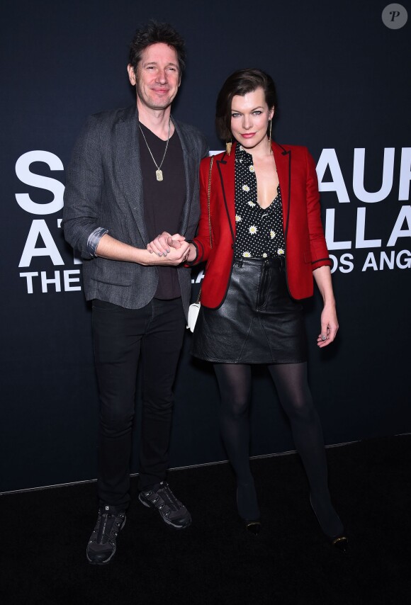 Paul W.S. Anderson et Milla Jovovich assistent au défilé "Saint Laurent at the Palladium" à l'Hollywood Palladium. Los Angeles, le 10 février 2016.