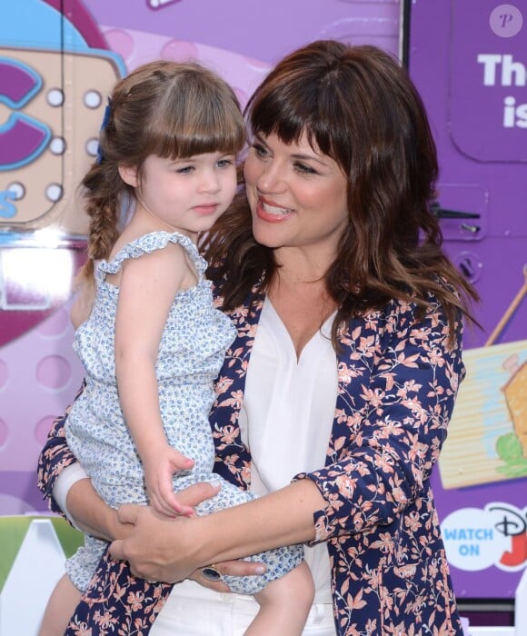 L'actrice Tiffani Thiessen et sa fille Harper Smith à l'événement Disney Doc Mobile Tour, à New York, le 21 août 2013.