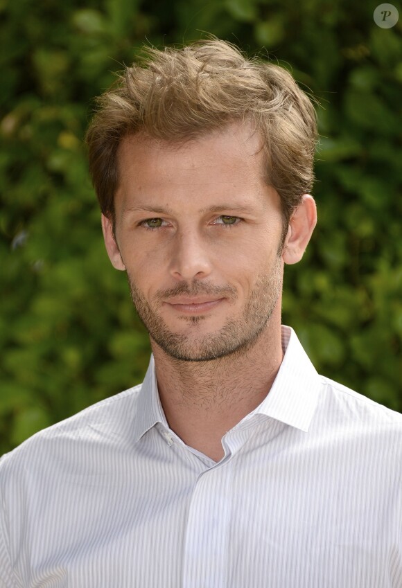 Nicolas Duvauchelle posant au photocall du film "Maintenant ou jamais" lors 7ème Festival du Film Francophone d'Angoulême, à Angoulême, le 23 août 2014.