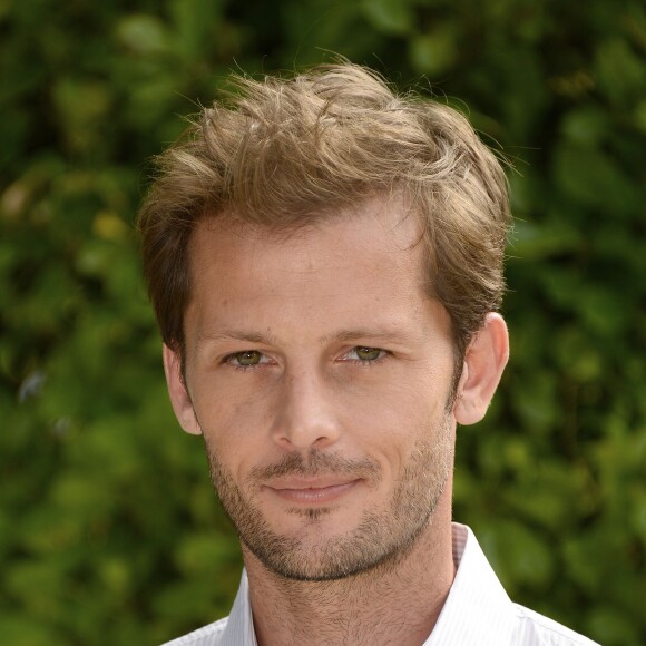 Nicolas Duvauchelle posant au photocall du film "Maintenant ou jamais" lors 7ème Festival du Film Francophone d'Angoulême, à Angoulême, le 23 août 2014.
