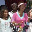Whitney Houston, son mari Bobby Brown et leur fille Bobbi Kristina à Disneyland, le 7 août 2014