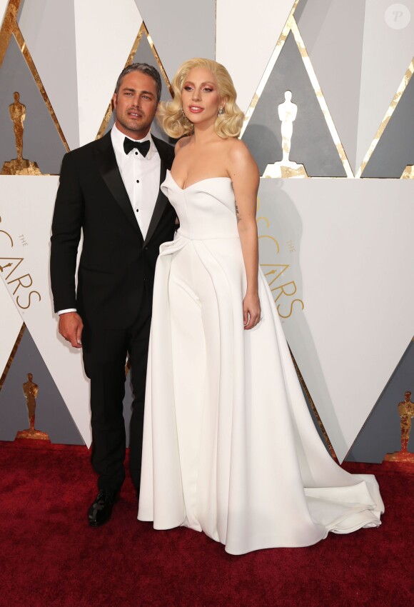 Lady Gaga et Taylor Kinney  à la 88ème cérémonie des Oscars à Los Angeles le 28 février 2016