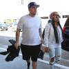 Rob Kardashian et sa compagne Blac Chyna vont prendre un vol à l'aéroport de LAX à Los Angeles, le 25 mars 2016. Blac Chyna a fait savoir à Rob Kardashian qu'elle voulait se marier et avoir des enfants avec lui, via Snapchat.