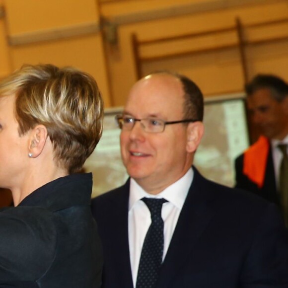 Exclusif - La princesse Charlene de Monaco, accompagnée par son mari le prince Albert II de Monaco, a rencontré les protagonistes du 3e Rallye Princesse Charlene, le 1er avril 2016, et a effectué la remise des prix puis posé pour une photo souvenir, au Collège Charles III. © Olivier Huitel / Pool Restreint Monaco / Bestimage