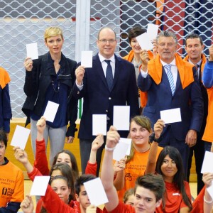 Exclusif - La princesse Charlene de Monaco, accompagnée par son mari le prince Albert II de Monaco, lors de la remise des prix du 3e Rallye Princesse Charlene, le 1er avril 2016 au Collège Charles III. © Michael Alesi / Bestimage