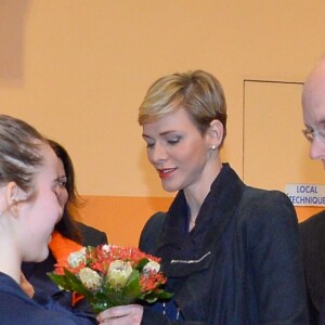 Exclusif - La princesse Charlene de Monaco, accompagnée par son mari le prince Albert II de Monaco, lors de la remise des prix du 3e Rallye Princesse Charlene, le 1er avril 2016 au Collège Charles III. © Michael Alesi / Bestimage