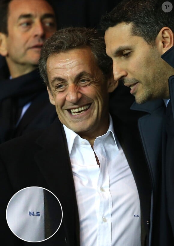 Nicolas Sarkozy porte ses initiales sur sa chemise au match de Ligue des Champions PSG - Manchester City au Parc des Princes à Paris le 6 avril 2016. © Cyril Moreau/Bestimage