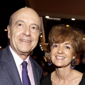 Alain Juppé et sa femme Isabelle au 33e Salon du Livre au parc des expositions de la porte de Versailles à Paris