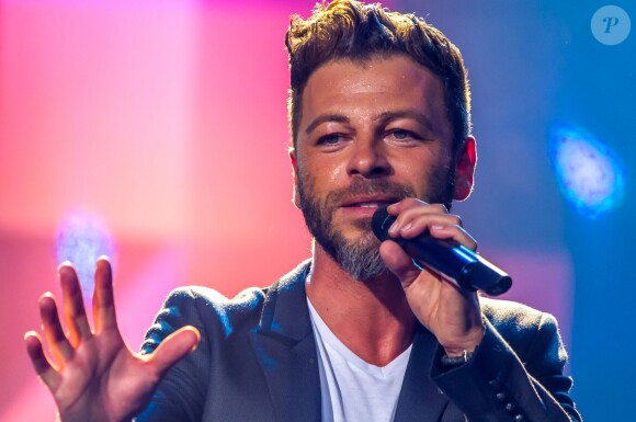 Christophe Maé en concert pour les 33 ans de la radio RFM sur la scène des Folies Bergère à Paris le 16 juin 2014