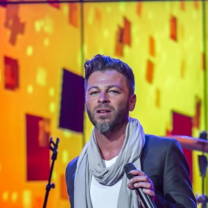 Christophe Maé en concert pour les 33 ans de la radio RFM sur la scène des Folies Bergère à Paris le 16 juin 2014