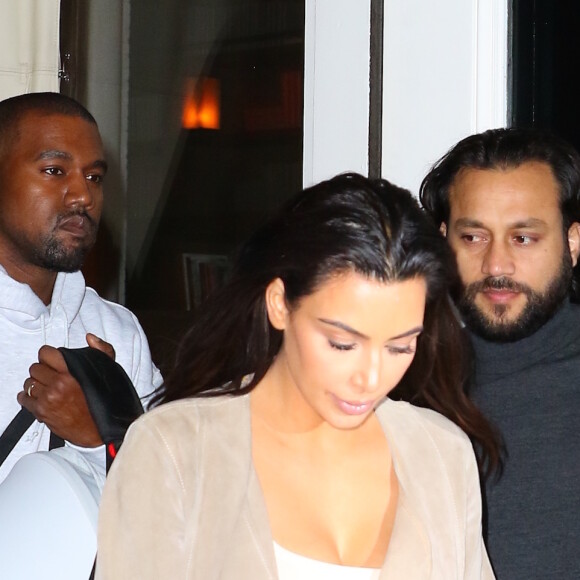 Kim Kardashian et Kanye West avec leur fils Saint West quittent l'hôtel Mercer à New York le 1er mai 2016.