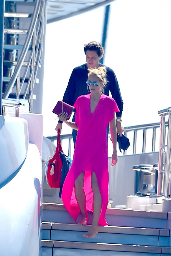 Heidi Klum et Vito Schnael quittent l'hôtel Eden Roc pour passer à la journée sur un yatch à Cannes, le 15 mai 2016