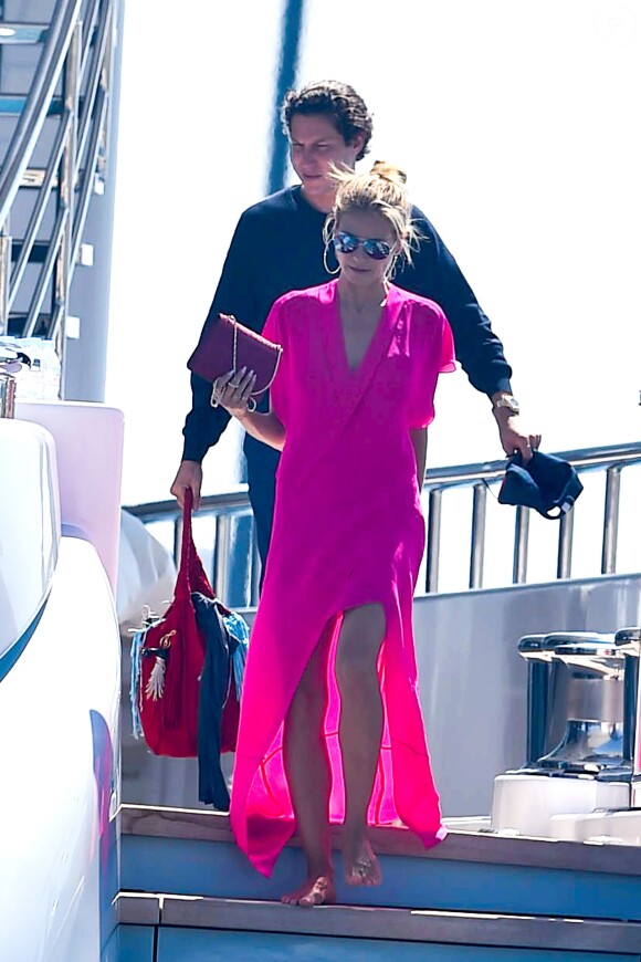 Heidi Klum et Vito Schnael quittent l'hôtel Eden Roc pour passer à la journée sur un yatch à Cannes, le 15 mai 2016
