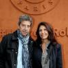 Michel Cymes et sa femme Nathalie au village des Internationaux de France de tennis de Roland-Garros à Paris le 22 mai 2016. © Dominique Jacovides/Bestimage