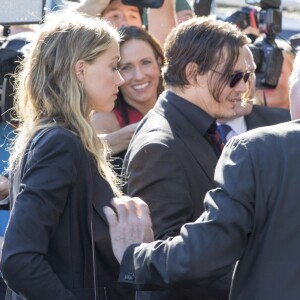 Johnny Depp et Amber Heard arrivent au tribunal de Southport pour le procès dans lequel est impliquée Amber pour avoir fait entrer sur le territoire ses chiens Pistol et Boo sans les déclarer à Southport le 18 Avril 2016.