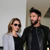 Nabilla Benattia quitte le tribunal de Nanterre avec son compagnon Thomas Vergara le 19 mai 2016. Elle est condamnée à 24 mois de prison dont 6 mois ferme pour avoir poignardé son compagnon Thomas Vergara. Le couple s'embrasse tendrement devant les caméras et sort avec le sourire.