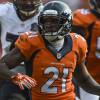 Aqib Talib, cornerback des Denver Broncos avec le numéro 21, retourne une interception pour un touchdown de 51 yards contre les Baltimore Ravens en septembre 2015.