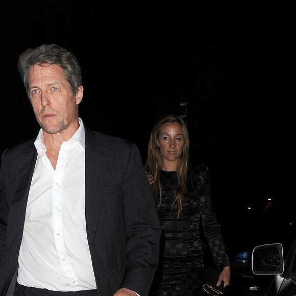 Hugh Grant et sa compagne Anna Elisabet Eberstein lors d'une soirée organisée chez Jimmy Carr à Londres, le 6 juin 2016.