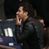 Michaël Youn assiste au match de football PSG contre Monaco au Parc des Princes à Paris le 5 octobre 2014.