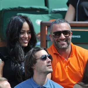Amel Bent et Patrick Antonelli - Internationaux de France de tennis de Roland Garros à Paris, le 5 juin 2014.