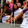 Les membres de la communauté homosexuelle se sont rassemblés devant l'université Sto. Tomas (UST) à Manille, pour rendre hommage aux victimes de l'attentat de la boîte de nuit gay Pulse à Orlando. Le 14 juin 2016