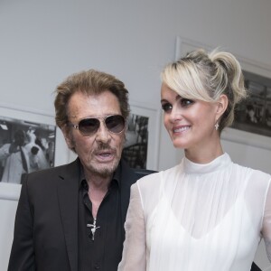 Johnny Hallyday et sa femme Laeticia Hallyday au défilé Christian Dior haute houture automne-hiver 2016-2017 à Paris. Le 4 juillet 2016 © Olivier Borde / Bestimage