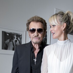 Johnny Hallyday et sa femme Laeticia Hallyday au défilé Christian Dior haute houture automne-hiver 2016-2017 à Paris. Le 4 juillet 2016 © Olivier Borde / Bestimage