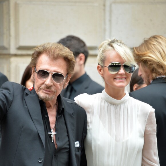 Johnny Hallyday et sa femme Laeticia quittant le défilé Christian Dior haute houture automne-hiver 2016-2017 à Paris. Le 4 juillet 2016 © CVS-Veeren / Bestimage