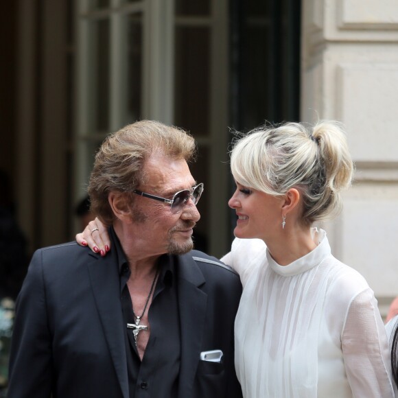 Johnny Hallyday et sa femme Laeticia quittant le défilé Christian Dior haute houture automne-hiver 2016-2017 à Paris. Le 4 juillet 2016 © CVS-Veeren / Bestimage