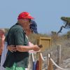 Exclusif - Niki Lauda et sa femme Birgit Wetzinger sur la plage lors de leurs vacances à Formentera, le 26 juillet 2016.