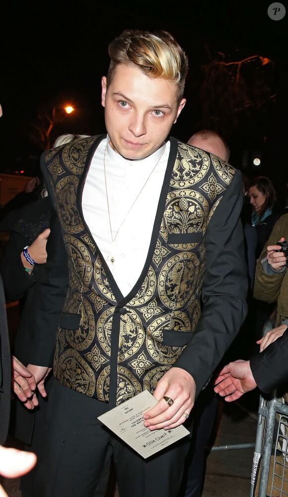 John Newman quittant la Universal Records Brit Awards after-party à Londres, le 19 février 2014.