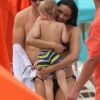 Robin Thicke, sa femme Paula Patton, et leur fils Julian en vacances a Miami, le 28 aout 2013.