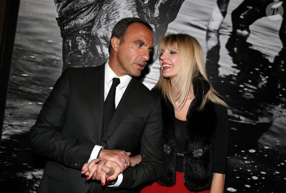 Nikos Aliagas et sa compagne Tina Grigoriou - Inauguration de l'exposition photographique de Nikos Aliagas intitulée "Corps et âmes" à la Conciergerie à Paris le 23 Mars 2016. © Dominique Jacovides / Bestimage