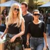 Kourtney Kardashian et Khloe Kardashian font du shopping et un tour de carrousel à Encino. Les 2 soeurs portent des chaussures avec de la fourrure noire, des sandales pour Kourtney et des claquettes pour Khloe! Le 23 août 2016