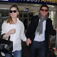 Melissa George et son compagnon Jean-David Blanc arrivent à l'aéroport de Nice, le 15 mai 2015 pour le 68e Festival International du Film de Cannes.