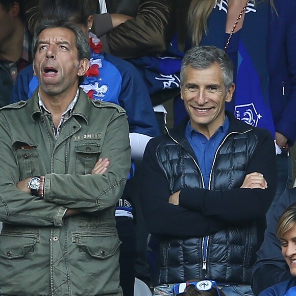 Michel Cymes et Nagui pendant le match de l'UEFA Euro 2016 France-Suisse au Stade Pierre-Mauroy à Lille, le 19 juin 2016. © Cyril Moreau/Bestimage