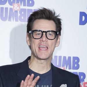 Jim Carrey lors du photocall du film "Dumb & Dumber De" à l'hôtel The Peninsula à Paris, le 25 novembre 2014.