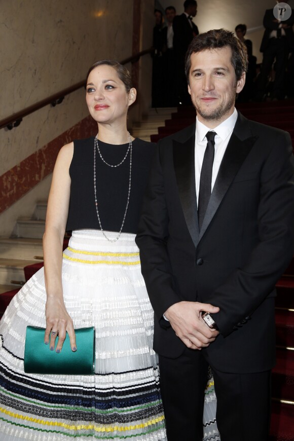 Guillaume Canet et sa compagne Marion Cotillard lors de leur arrivée à la 40ème cérémonie des Cesar organisée au théâtre du Châtelet à Paris, le 20 février 2015