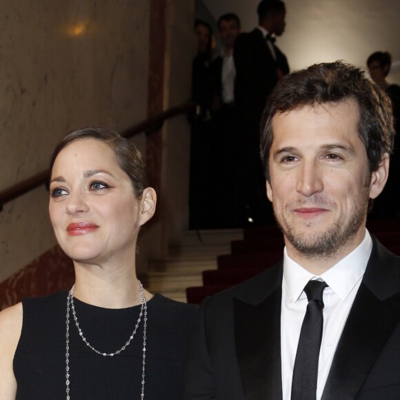 Guillaume Canet et sa compagne Marion Cotillard lors de leur arrivée à la 40ème cérémonie des Cesar organisée au théâtre du Châtelet à Paris, le 20 février 2015