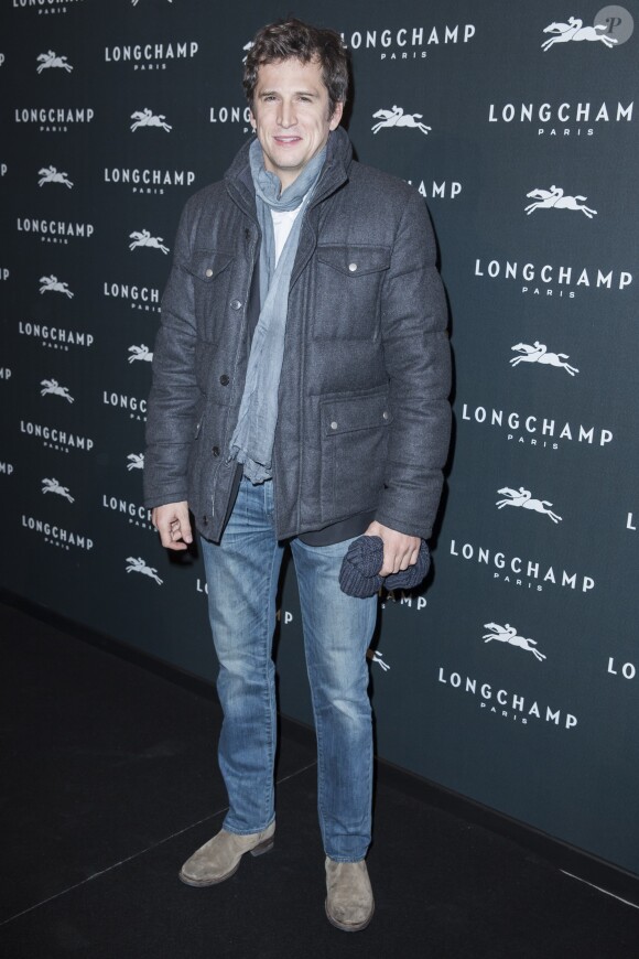 Guillaume Canet à l'ouverture de la boutique Longchamp sur les Champs-Elysées à Paris le 4 décembre 2014.