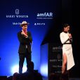 Andy Boose et Adriana Lima lors de la vente aux enchères de l'AmfAR à Milan en Italie, le 24 septembre 2016