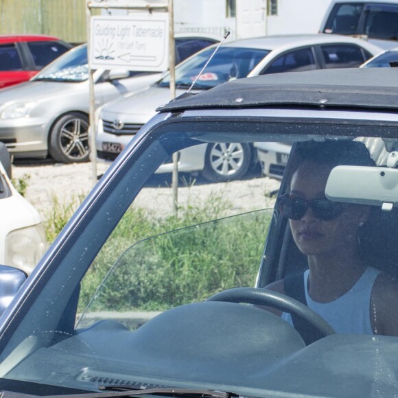 Semi-exclusif - Rihanna et son grand-père Lionel Braithwaite - Rihanna assiste au baptême de son neveu Nicoli Carter dans une église de la Barbade le 9 octobre 2016.