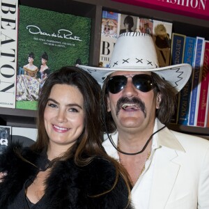 Semi-Exclusif - Frédéric Beigbeder et sa femme Lara Micheli (enceinte) au Lancement du livre "Le Caca's Club" de Frédéric Beigbeder, Guillaume Rappeneau et Christophe Tison à la librairie Assouline à Paris, le 9 octobre 2015.