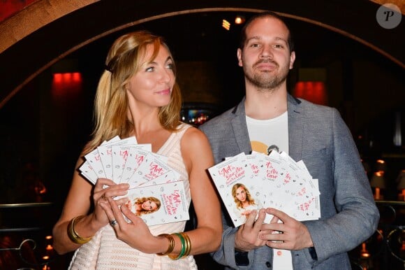 Amélie Etasse et Clément Vallos à la soirée de lancement du livre "L'art du bien-être dans ton coeur" d'Amélie Etasse au Buddha Bar à Paris, le 19 octobre 2016.