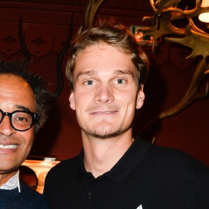 Yannick Noah et Yannick Agnel à la soirée de gala des 20 ans de l'association "Fête le Mur" de Yannick Noah au Chalet des Iles à Paris le 9 novembre 2016.