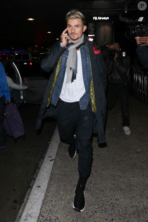 Orlando Bloom arrive à l'aéroport de LAX à Los Angeles en provenance de Londres, le 14 novembre 2016